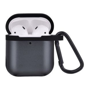 Black wireless earbuds in an open charging case with a carrying loop, isolated on a green background.