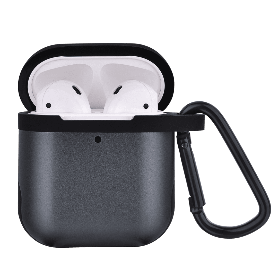 Black wireless earbuds in an open charging case with a carrying loop, isolated on a green background.