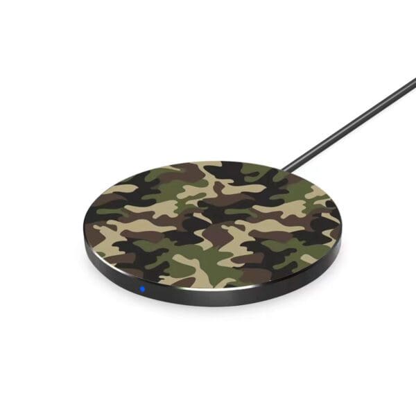 A camouflage patterned wireless charging pad with a blue led indicator on a white background.