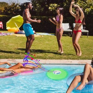 Group of friends enjoying a sunny day by the pool with two playing volleyball, one lounging on a float with music, and another relaxing in a swim ring.