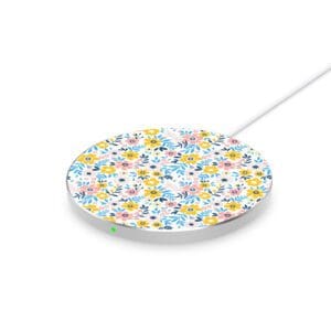 Round wireless charging pad with a floral pattern on a white background.