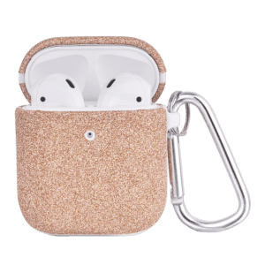 Wireless earbuds in an open glittery gold case with a silver carabiner attached, isolated on a green background.
