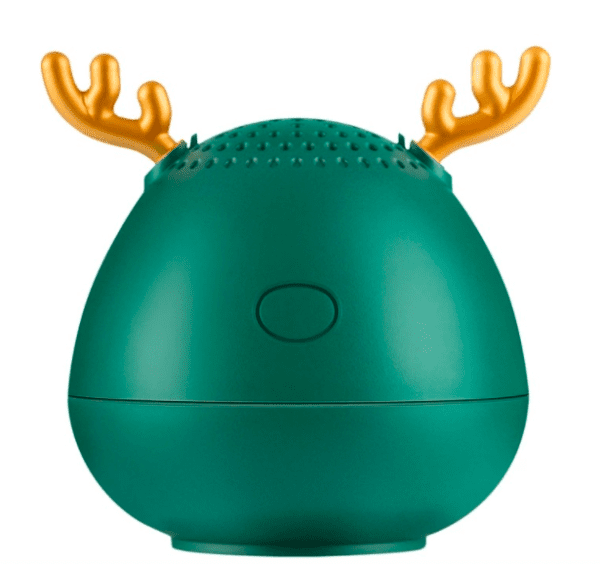 A green, egg-shaped bluetooth speaker with orange deer antlers on top.