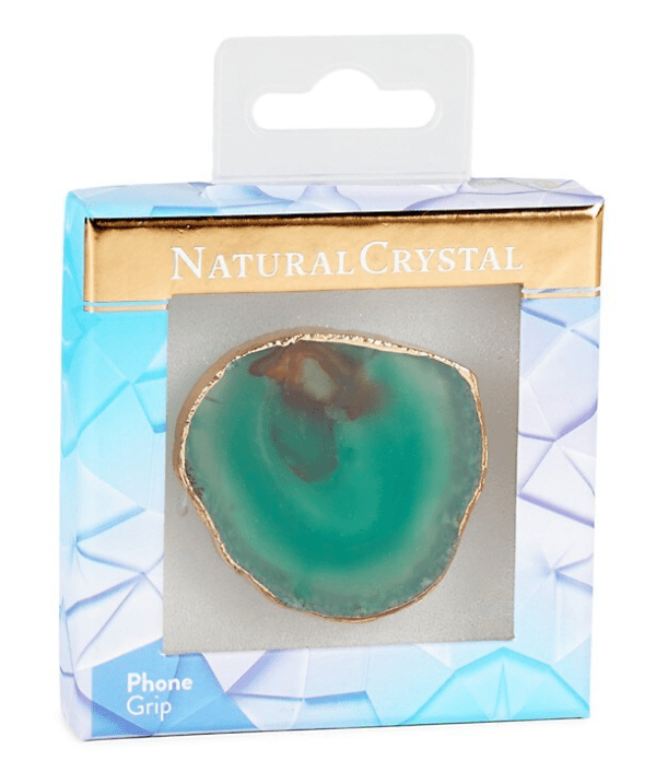 Packaged natural crystal phone grip displayed in a box labeled "natural crystal," featuring a prominent green and blue crystal slice with golden edges.