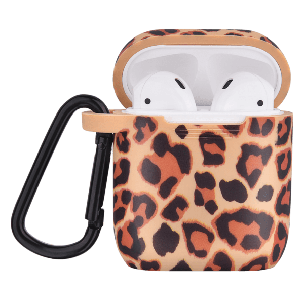 Wireless earbuds in an open leopard print case with a beige lid and black carabiner, isolated on a green background.