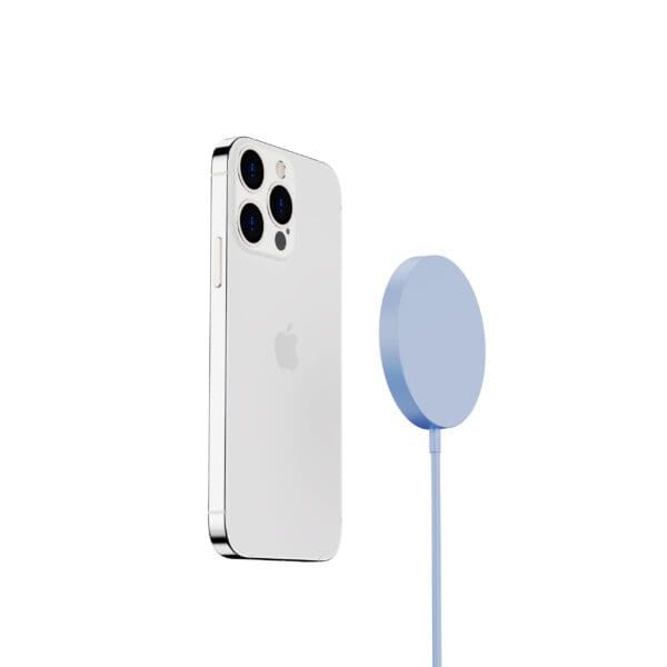 Silver smartphone with three rear cameras next to a light blue circular wireless charger on a white background.