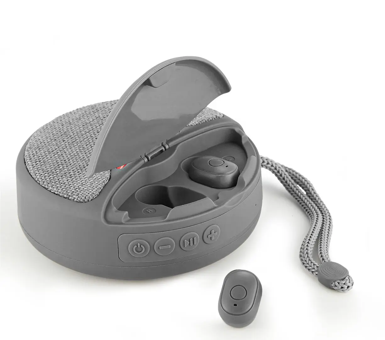A gray wireless earbud set with one earbud next to an open charging case, featuring a fabric texture and a wrist strap.