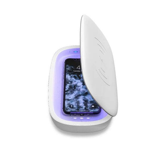 A white uv smartphone sanitizer with an open lid, revealing a smartphone inside on a purple interior.