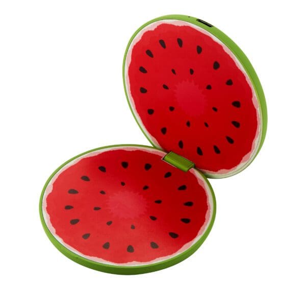 Two round watermelon-themed notepads with covers open, resembling sliced watermelon halves, isolated on a white background.