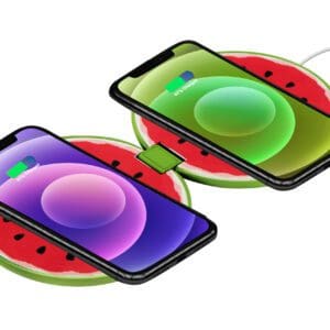 Two smartphones with colorful wallpapers charging on watermelon-shaped wireless chargers.