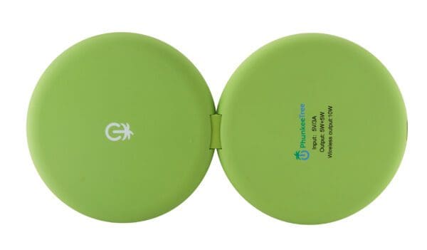 Green collapsible silicone cup closed, with "gx" logo on one side and "fundware - world's most compact foldable cup" written on the other side.