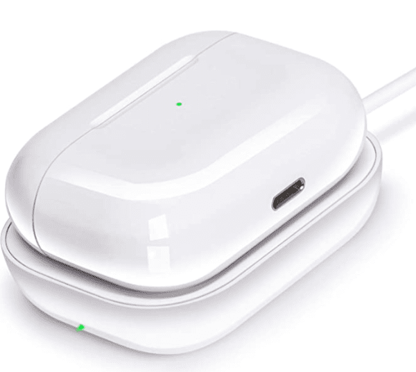 White wireless earbuds in their charging case, connected by a usb-c cable, with led indicators lit green.