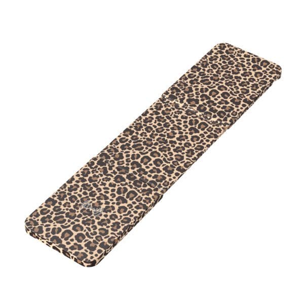 A leopard print paper towel sitting on top of a table.