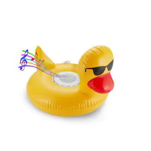 Yellow rubber duck-shaped pool float with built-in speakers and sunglasses, emitting colorful musical notes, isolated on white background.