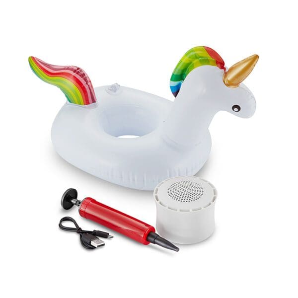 Inflatable unicorn pool float next to a manual air pump and a waterproof speaker with a usb charging cable.