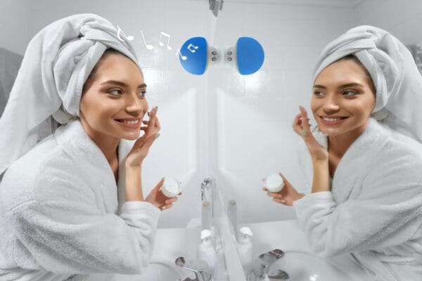 A woman in a bathrobe and towel on her head applies face cream while looking at her reflection in the mirror, with music notes floating above.