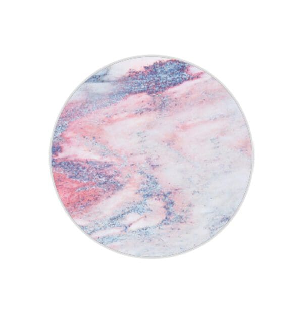 Round coaster with a marbled pink and blue design on a white background.