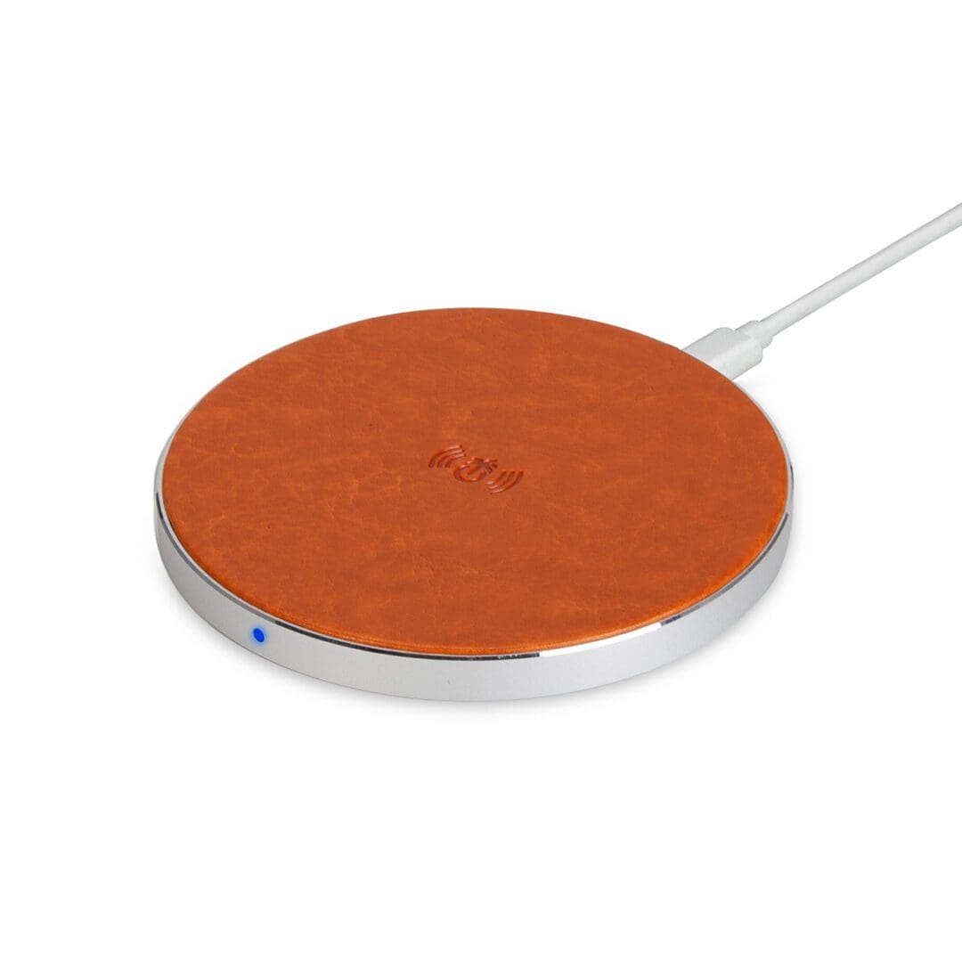A wireless charger is shown in orange.