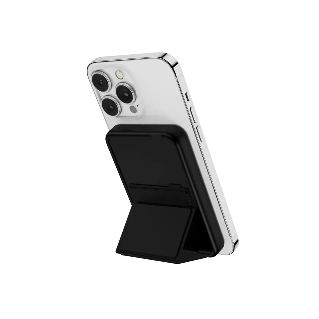 Silver smartphone with a triple camera system, showcased with a black flip cover serving as a stand, isolated on a white background.