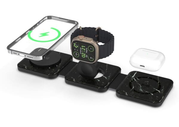 A Tri Fold Charging Station with USB C Adapter with a smartphone, smartwatch, and earbuds case on separate charging pads, all displaying charging symbols.