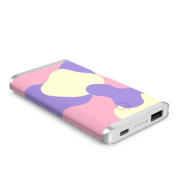 Portable Grey - Leather 5K Wireless Charging Power Bank with a colorful abstract design.