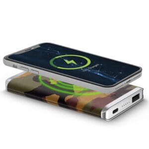 Smartphone lying on a Houndsooth - Leather 5K Wireless Charging Power Bank, displaying a charging symbol on its screen.