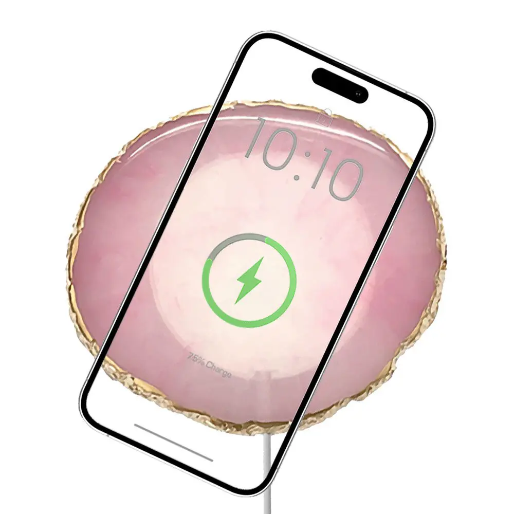 Wireless Charging Crystal Pads displaying a wireless charging icon with a translucent pink background overlaying an image of a sliced fruit, possibly a grapefruit, visible through the screen.