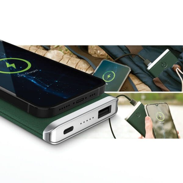 Portable Grey - Leather 5K Wireless Charging Power Bank charging two smartphones via USB cables, with one phone displaying a battery charging icon.