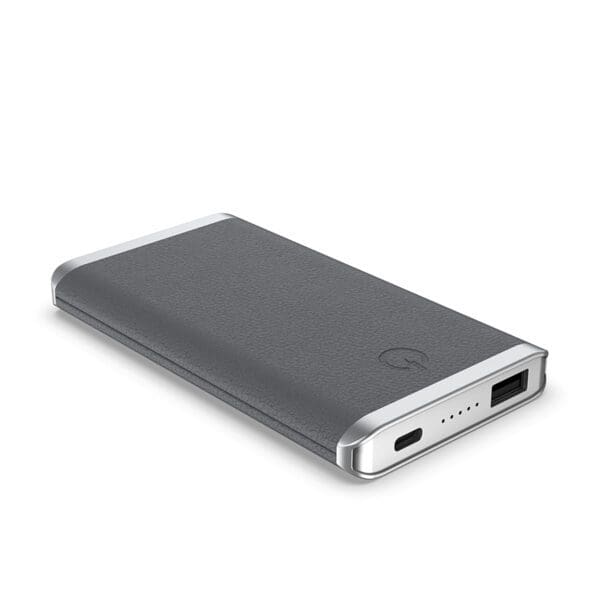 Portable wireless Grey - Leather 5K Wireless Charging Power Bank with a USB port, displayed on a white background.