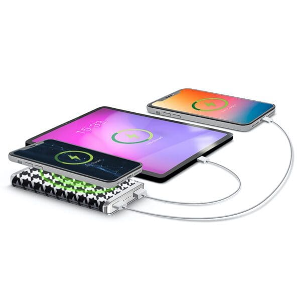 Three smartphones charging on a Leather Wireless Charging Power Bank with indicator lights on and visible cables.
