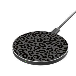 A Black Leopard wireless charging pad with a leopard print design, featuring a green indicator light and a connected cable.