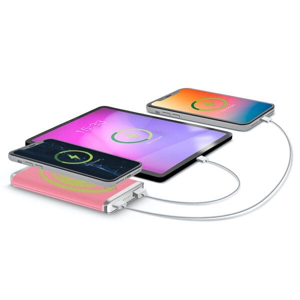Three smartphones charging wirelessly on a Grey - Leather 5K Wireless Charging Power Bank, displaying colorful battery icons on their screens.