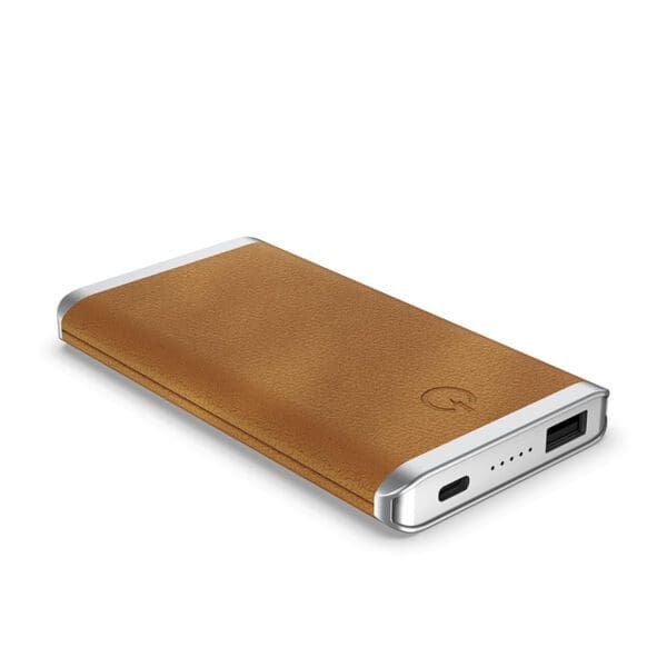 Portable Grey - Leather 5K Wireless Charging Power Bank with white trim, viewed from a slight angle on a plain background.